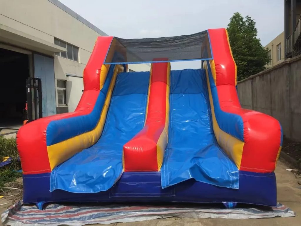 Colorful bounce house with an attached slide