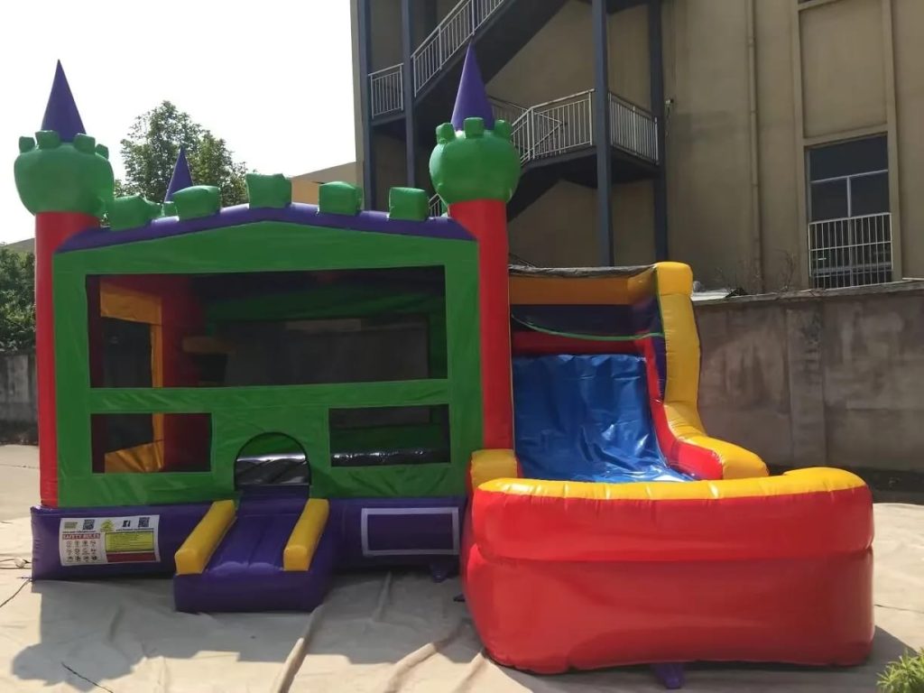 Colorful bounce house with an attached slide